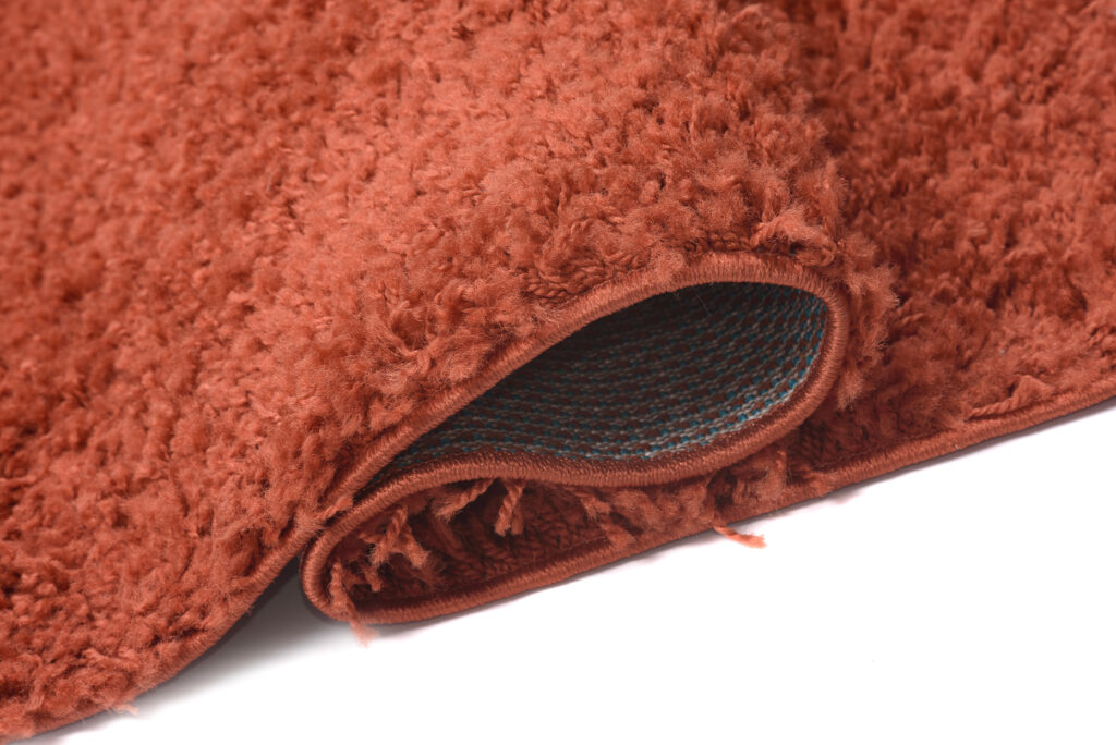 Tapis Essence Shaggy Poil Long Motif Uni Roux Brique